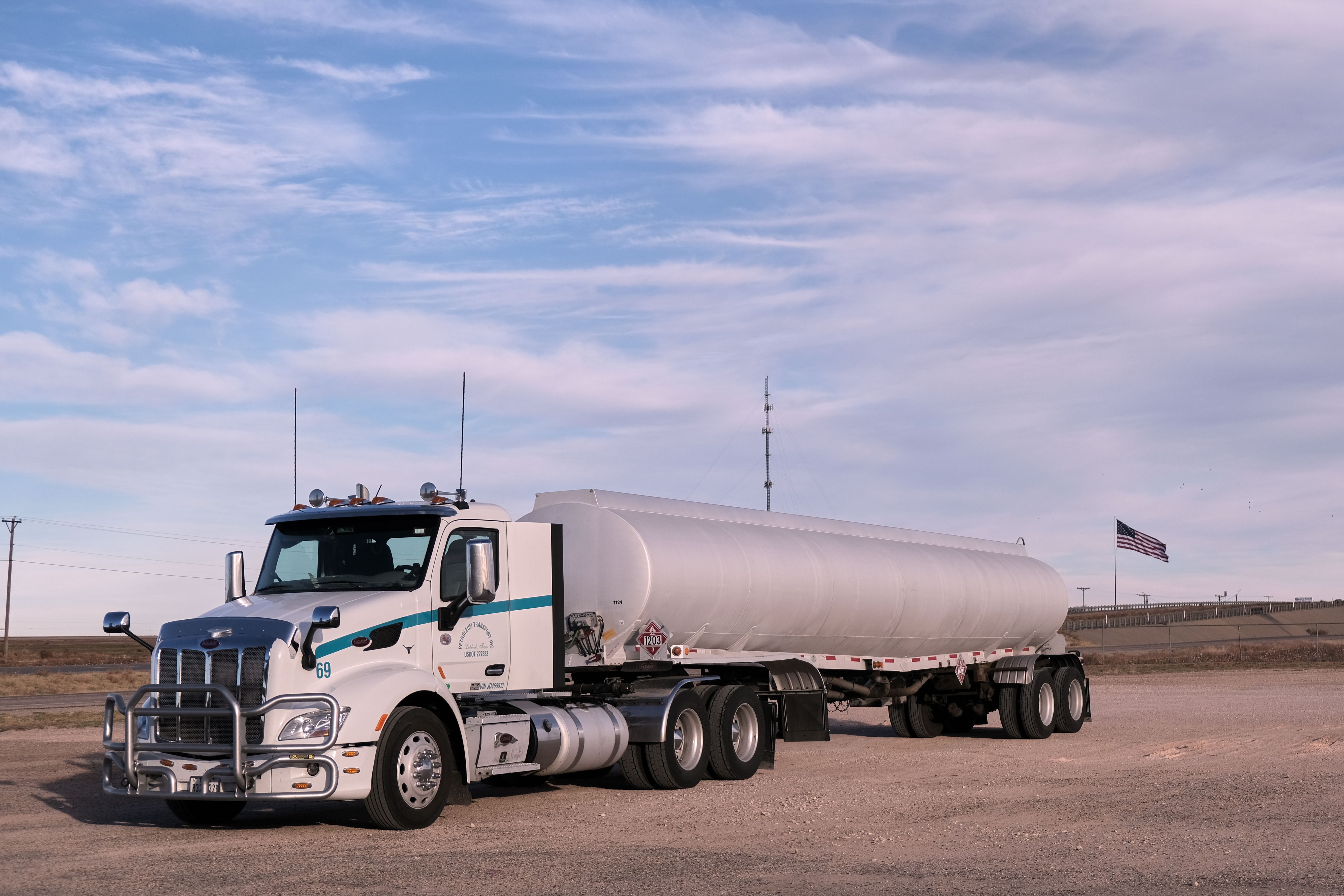 Propane delivery truck supplying a rural propane customer
